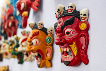 Masks of Mahakala, a wrathful manifestation of Buddha sold at a souvenir shop in India