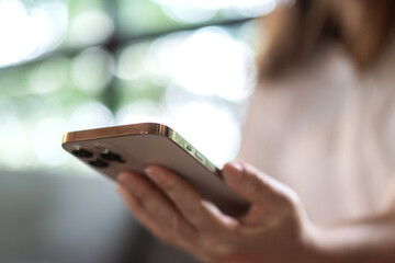 Person using modern smartphone device, engaged with phone, texting, browsing or using app, technology, communication mobile apps, social media and modern lifestyles, advertisements, tech blogs, media