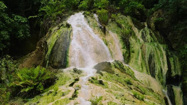 View from above of unique steaming Bilawa Hot Waterfall. Davao de Oro, Philippines.