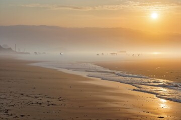 Fototapeta premium Tranquil beach scene at sunrise with soft golden light reflecting on the water and sand. Ideal for peaceful and serene themes.