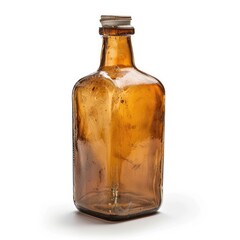 An old, amber glass bottle with a cork stopper