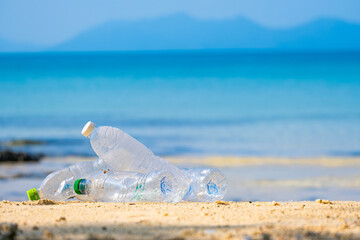 Trash, plastic cups and plastic bags at the beach. environmental problem concept and healing the...
