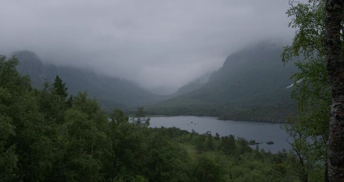 Summer in Norway. Beautiful valley Innerdalen, lake Innerdalsvatna and mountain Innerdalst&aring;rnet.