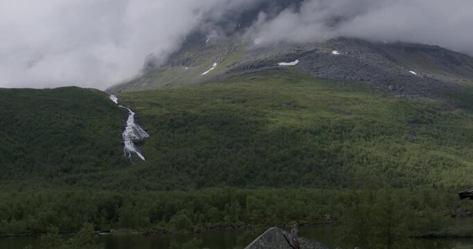 Summer in Norway. Beautiful valley Innerdalen, lake Innerdalsvatna and mountain Innerdalst&aring;rnet.