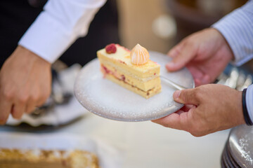 the cake on a plate placed on a table