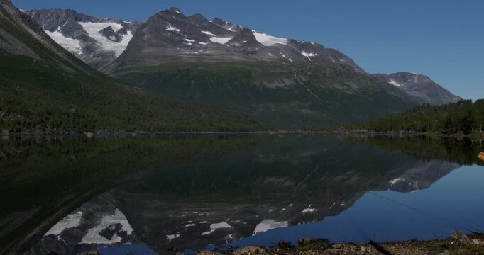 Summer in Norway. Beautiful valley Innerdalen, lake Innerdalsvatna and mountain Innerdalst&aring;rnet.