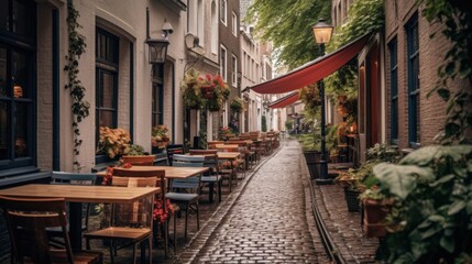 Fototapeta premium Cobblestone Alleyway with Cafe Tables and Red Awning