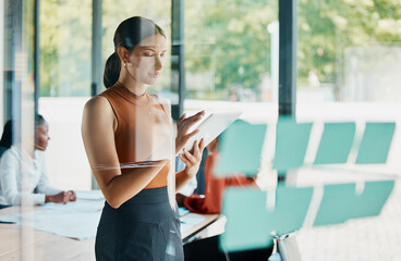 Glass, sticky notes and woman with tablet, boardroom and reading for brainstorming in business and serious. Online, employee and meeting for company, digital and research on social media in USA