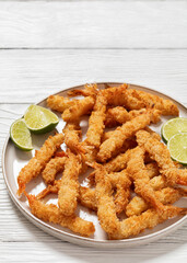 deep fried panko breaded shrimp on a plate