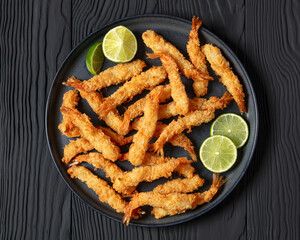 deep fried panko breaded shrimp on a plate