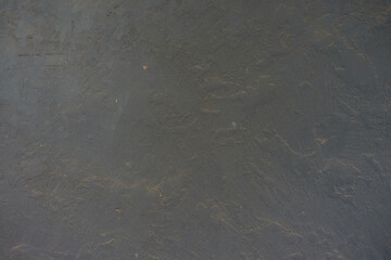 dusty and weathered dark grey painted wall texture