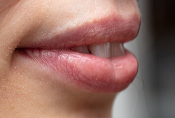Close-up of lips on a girl's face. Macro