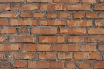 Texture of red brick wall with standard stretcher bond