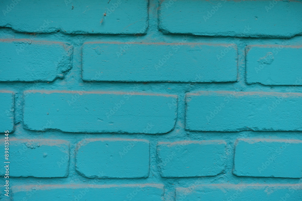 Sticker Close view of aqua blue painted brick wall