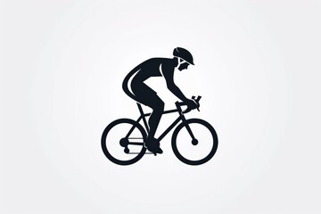 Obraz premium The silhouette of a cyclist pedaling at high speed on a racing bike. The image captures the essence of speed and fitness, highlighting the dedication and passion in cycling.