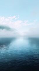 Fototapeta premium Lake merging into a mist, calm water, blue tone.