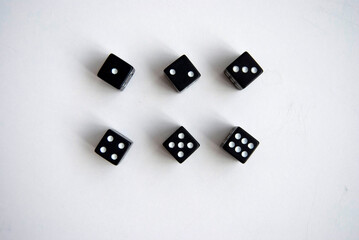 Dice isolated. Black dice on white. Black and white dice. 6 dice with all numbers from 1 to 6.