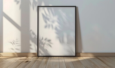 Blank photo frame on textured surface with shadows from leaves