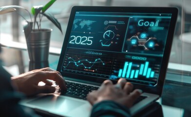 Businessman using a laptop with New year resolution goal 2025.