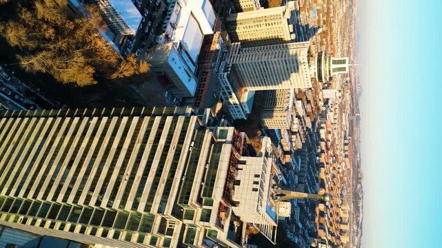 Vertical drone shot of sunset lights over a residential area in Zibo, Shandong Province, China.