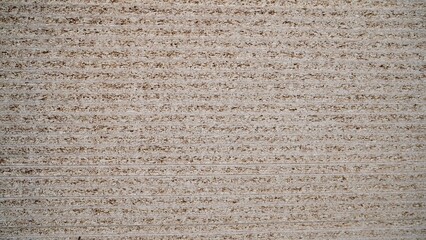 OSB - oriented strand board. Stacked OSB sheets. Sheet material for the construction of frame houses. Blanks for furniture production. Stack of chipboard at a furniture factory.