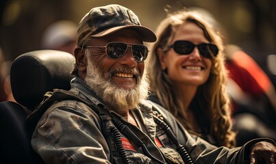 Man With Beard and Sunglasses Sitting Next to Woman