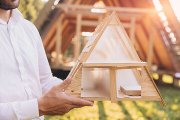 Man builder. Contractor for construction company. Architect in unfinished building. Builder in...