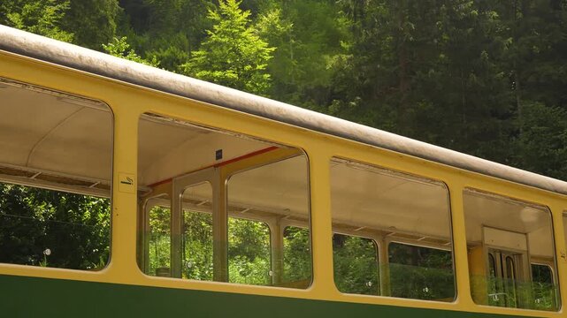 Vintage train running slowly. The railroad truck with longline railway wagons.