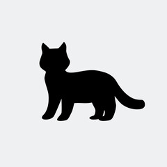 A silhouette image of a kitten. The cat stands on all fours. Vector illustration.