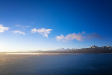 the sunrise of Peiku Co and Mt.Shishapangma with golden fog in tibet