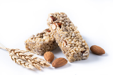 Healthy Muesli bars with nuts and seeds isolated on white background	