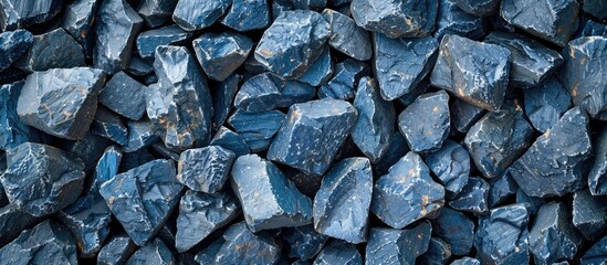 Background of crushed blue stones creating a textured gravel surface with copy space image