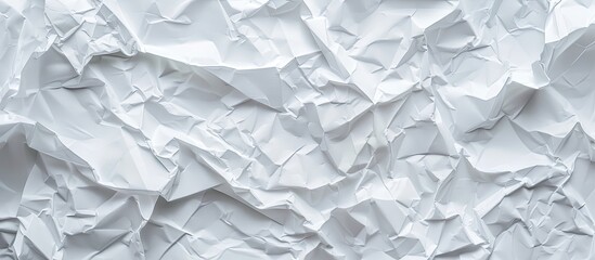 Obraz premium Top view of crumpled white paper texture with copy space image