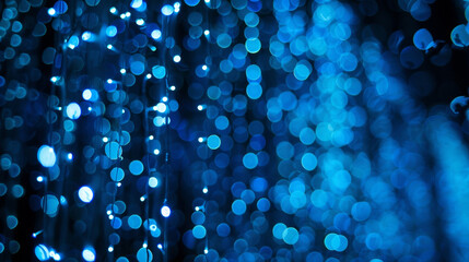 blue bokeh background. dark blue abstract background featuring a glow particle effect. Bokeh blue background banner futuristic business data technology modern concept. blue and white light 