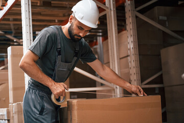 Foreman is in the storehouse, shipping distribution business