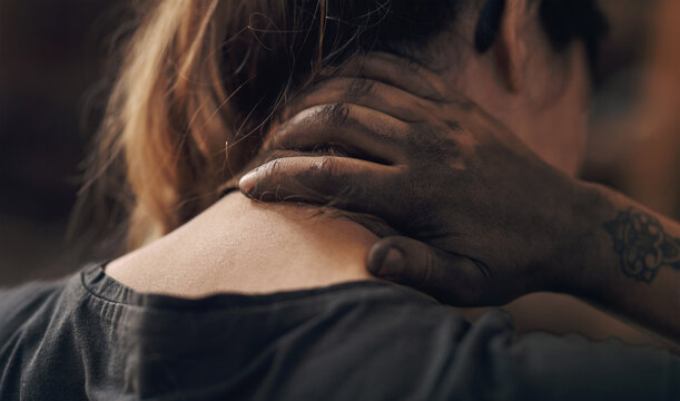 Dirt, hand and woman in workshop with neck pain, muscle strain and stress with injury for metal production. Back, foundry worker and ache for accident in factory, poor posture and anatomy of employee - Powered by Adobe