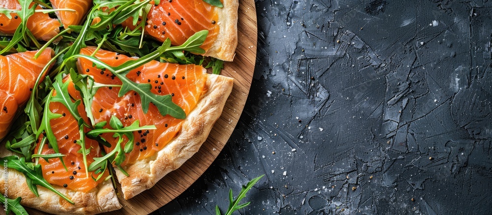 Aufkleber Delicious restaurant dish featuring salmon and arugula on a pizza with a visually appealing presentation for a food enthusiast complete with copy space image