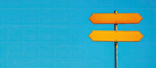 Close up comparison background featuring two blank signs on a blue backdrop providing copy space for your text and functioning as direction signs