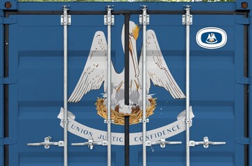 Louisiana US state flag depicted on metal doors of shipping cargo container outdoors in docks area...