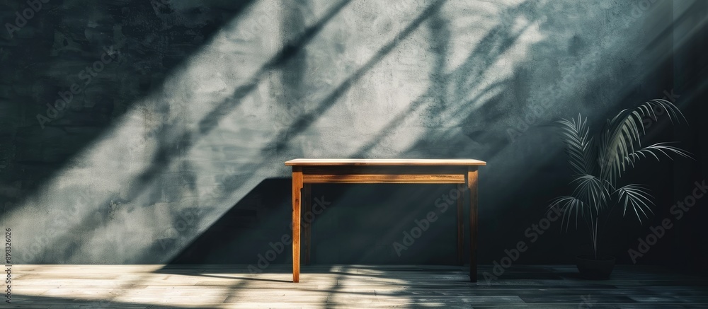 Poster a desk with ample blank space to showcase your product set against a wall casting shadows ideal for 
