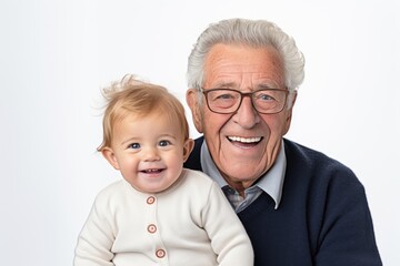 Grandchild laughing portrait glasses.
