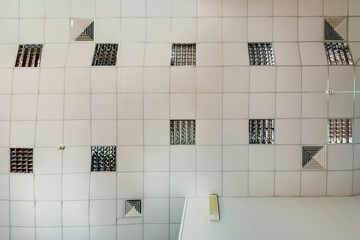 cassette stretched or suspended ceiling with square halogen spots lamps and drywall construction in...