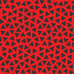 Triangular seamless pattern, a collection of scattered black triangles on a red background