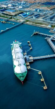 Portrait LNG (Liquified Natural Gas) tanker anchored in Gas terminal gas