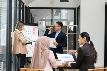Asia business meeting consultations of business people in the company's meeting room.