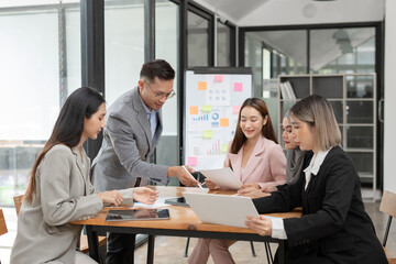 Asia business meeting consultations of business people in the company's meeting room.