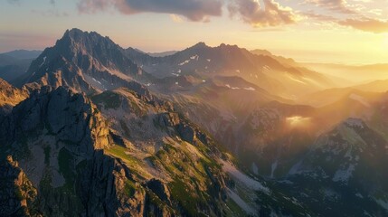 Fototapeta premium Mountain Peaks Bathed in Golden Sunset Light
