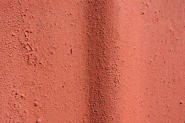 Construction and renovation work, metal rough canvas with dents and painted brown paint.