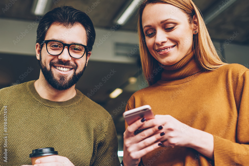 Aufkleber portrait of happy handsome hipster guy in eyewear holding coffee and spending time with friend while