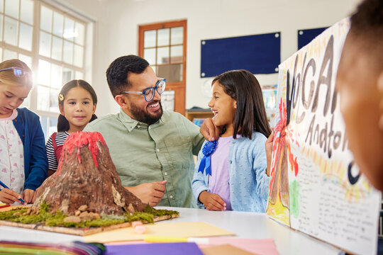 Little girl receives an award for the best science project
